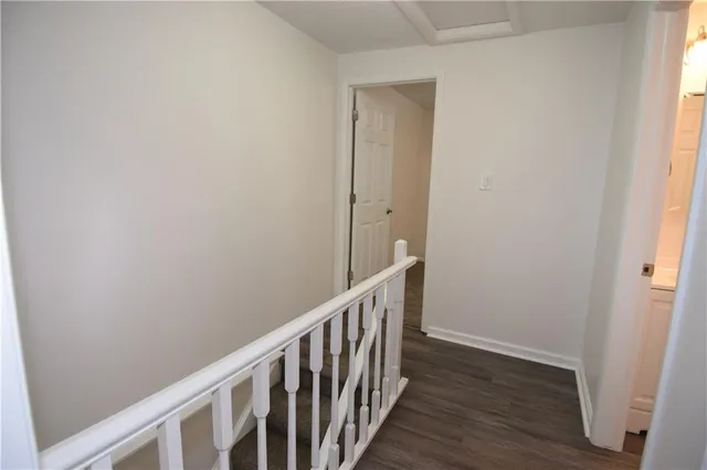 a view of a bedroom with windows