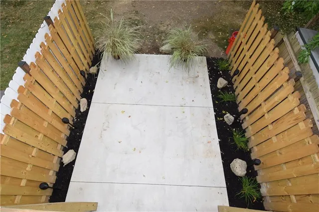 a view of outdoor space with playground and green space