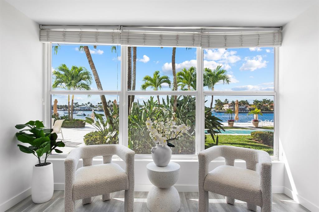 215 North Birch Road, Unit 1C Fort Lauderdale, FL 33304 - Photo 13 of 21 a view of a dining table and chairs in a room