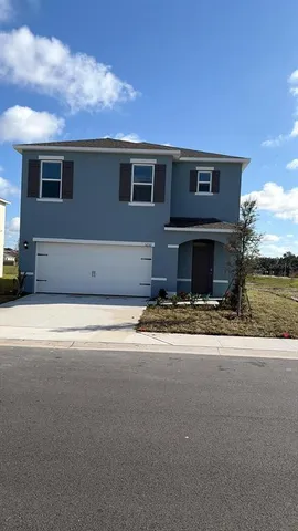 a house view with a garden space