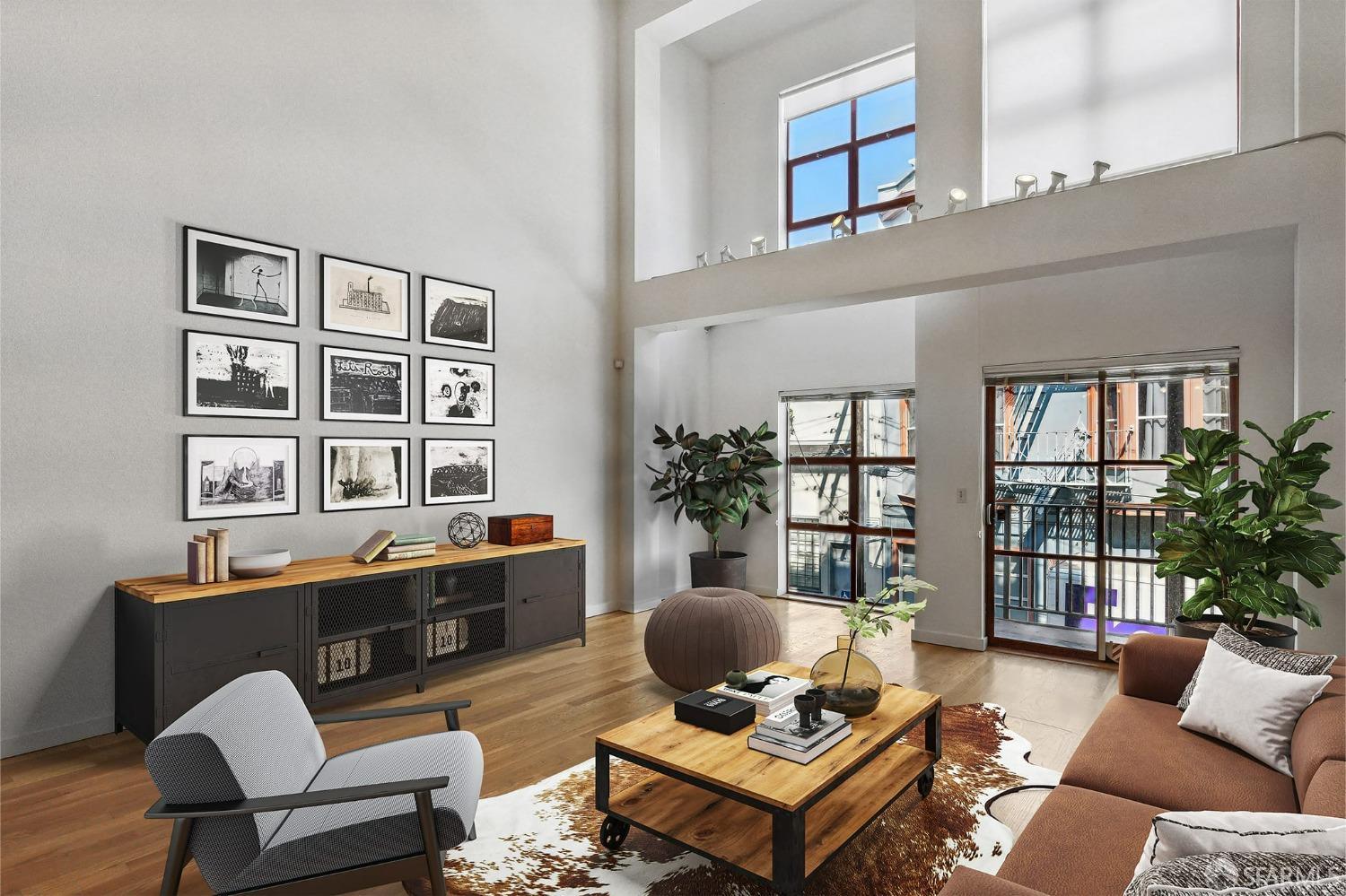 745 Clementina Street, Unit A San Francisco, CA 94103 - Photo 1 of 27 a living room with furniture a rug and a window