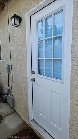 a view of a room with rack on the wall