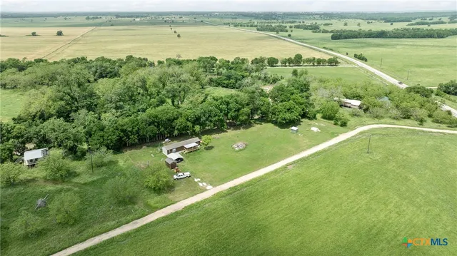 a view of a lush green space and lake view
