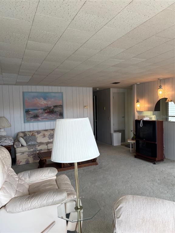 10057 110th Place, Unit 243 Largo, FL 33773 - Photo 17 of 32 a room with furniture