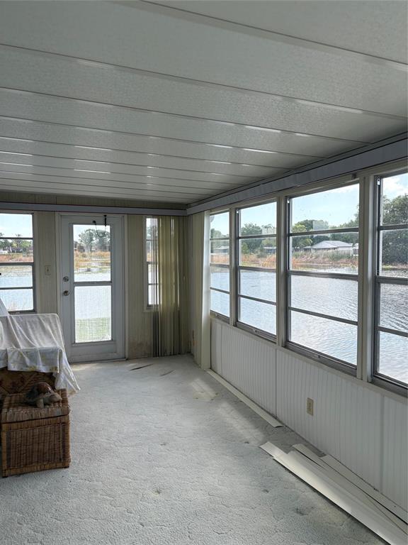 10057 110th Place, Unit 243 Largo, FL 33773 - Photo 30 of 32 a view of an empty room and a window