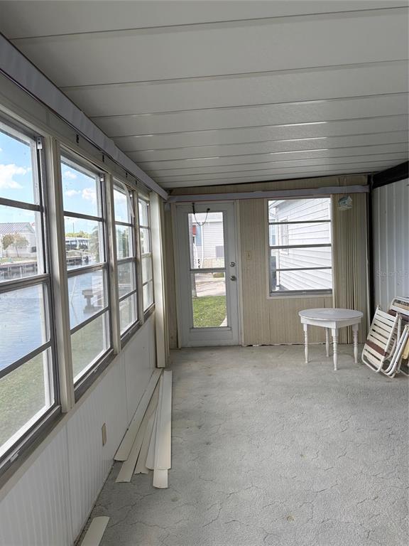 10057 110th Place, Unit 243 Largo, FL 33773 - Photo 31 of 32 an empty room with windows