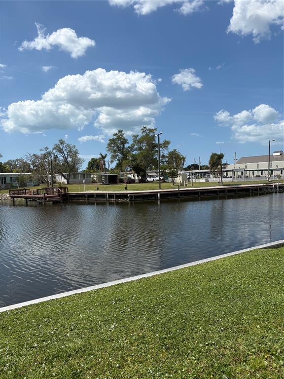 10057 110th Place, Unit 243 Largo, FL 33773 - Photo 8 of 32 a view of a lake with a city view