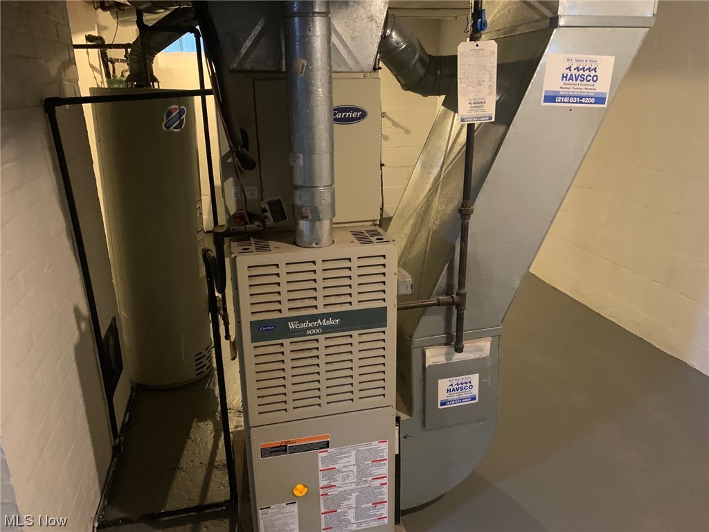 1456 Evanston Road Lyndhurst, OH 44124 - Photo 26 of 32 Utility room with water heater