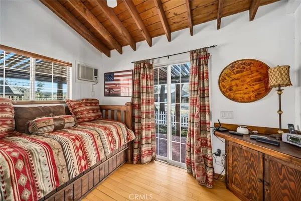 a view of a backyard with swimming pool