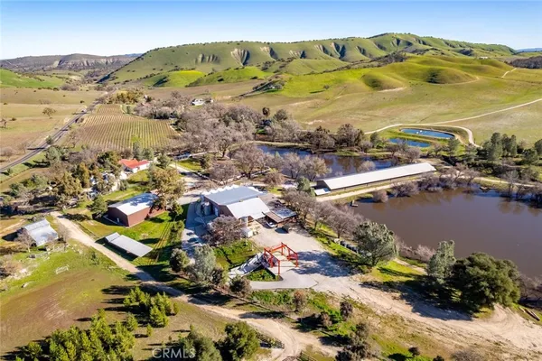 a view of empty room with wooden walls