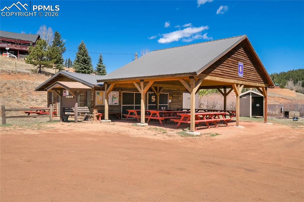 756 Spring Valley Drive Divide, CO 80814 - Photo 37 of 48 a view of a house with a yard and sitting area