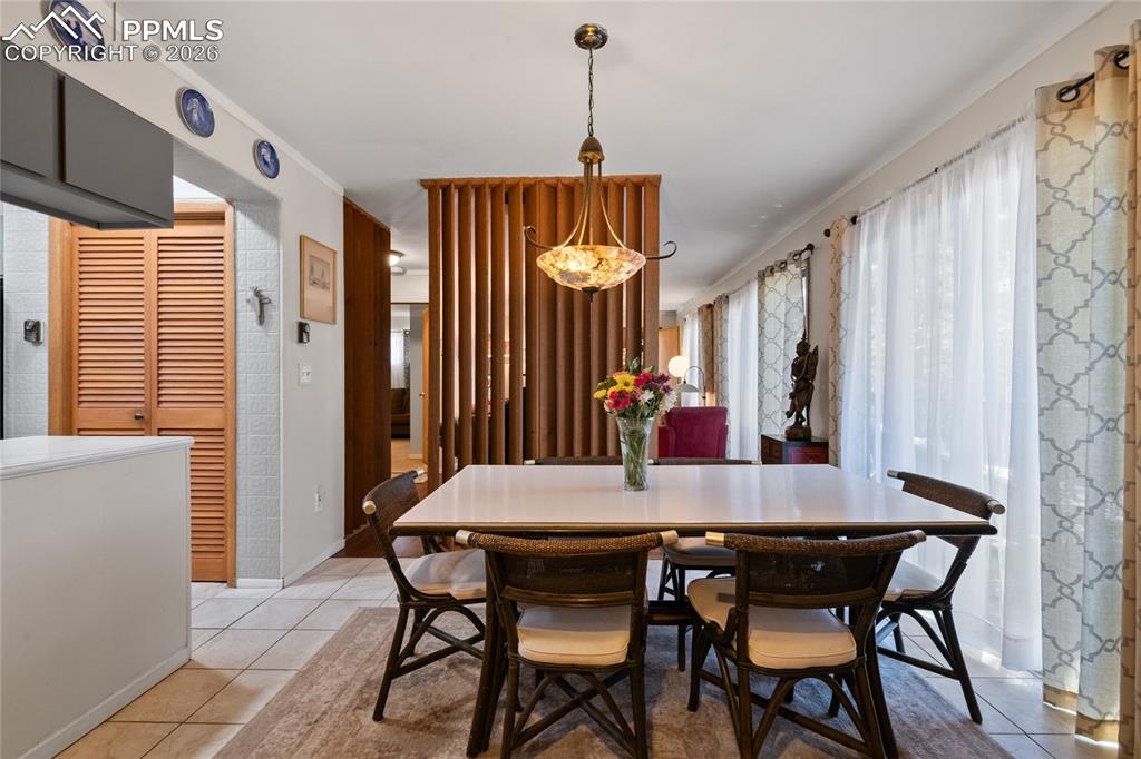 756 Spring Valley Drive Divide, CO 80814 - Photo 8 of 48 a dining room with furniture and window