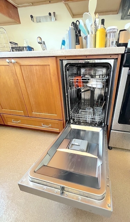 371 Harvard Street, Unit 3C Cambridge, MA 02138 - Photo 15 of 27 a utility room with dryer and washer