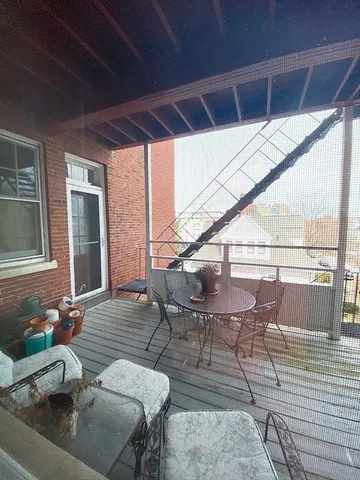 a view of deck with seating area