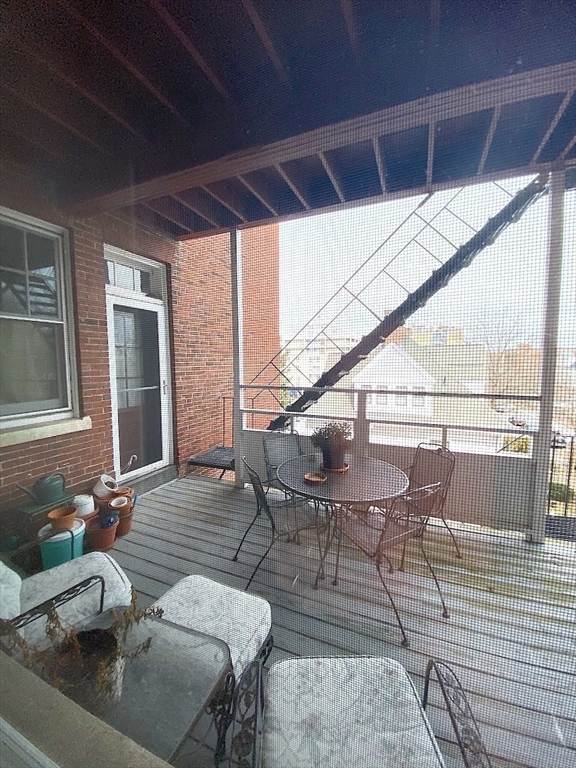 371 Harvard Street, Unit 3C Cambridge, MA 02138 - Photo 26 of 27 a view of deck with seating area