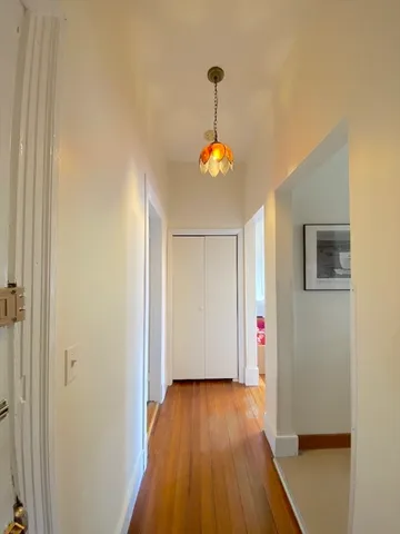 a very nice looking room with wooden floor