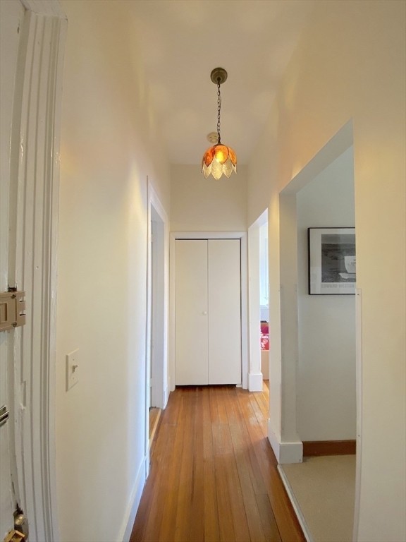 371 Harvard Street, Unit 3C Cambridge, MA 02138 - Photo 4 of 27 a very nice looking room with wooden floor