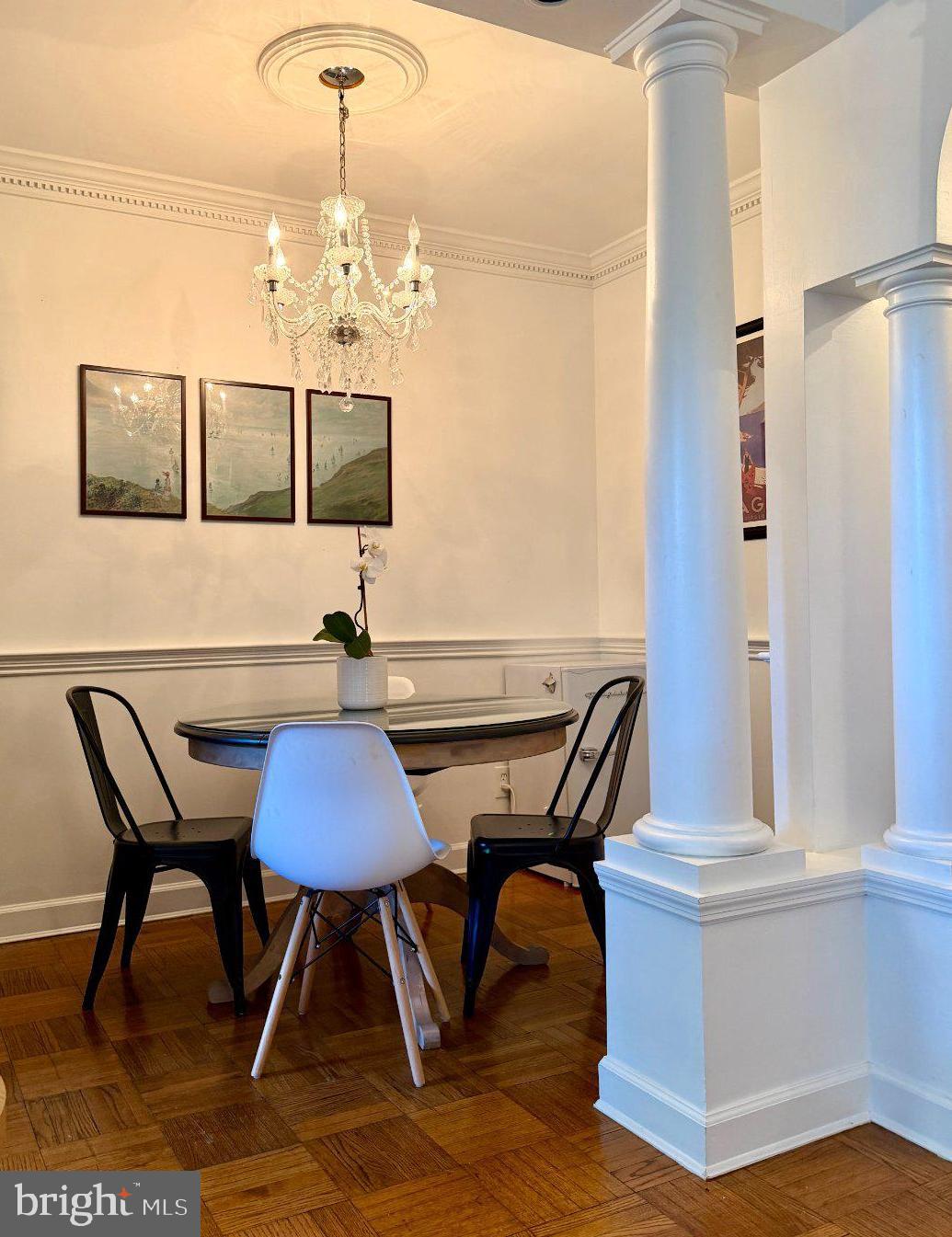 2500 Q Street Northwest, Unit 307 Washington, DC 20007 - Photo 11 of 13 Elegant dining space with classic charm.