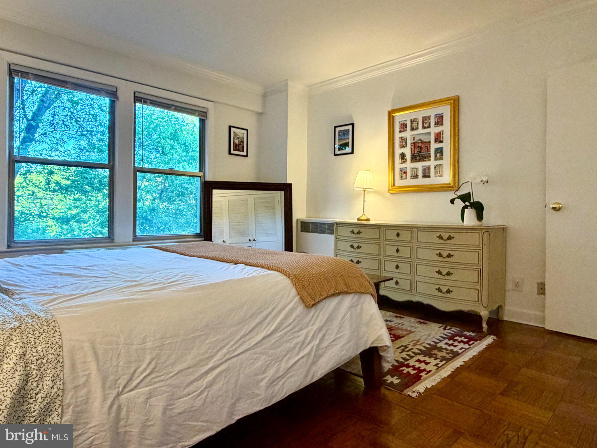 2500 Q Street Northwest, Unit 307 Washington, DC 20007 - Photo 6 of 13 Serene bedroom with natural light.