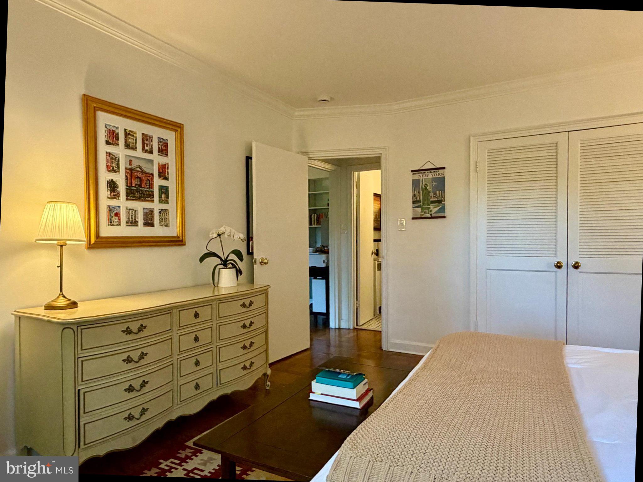 2500 Q Street Northwest, Unit 307 Washington, DC 20007 - Photo 7 of 13 Charming large bedroom with warm ambiance.