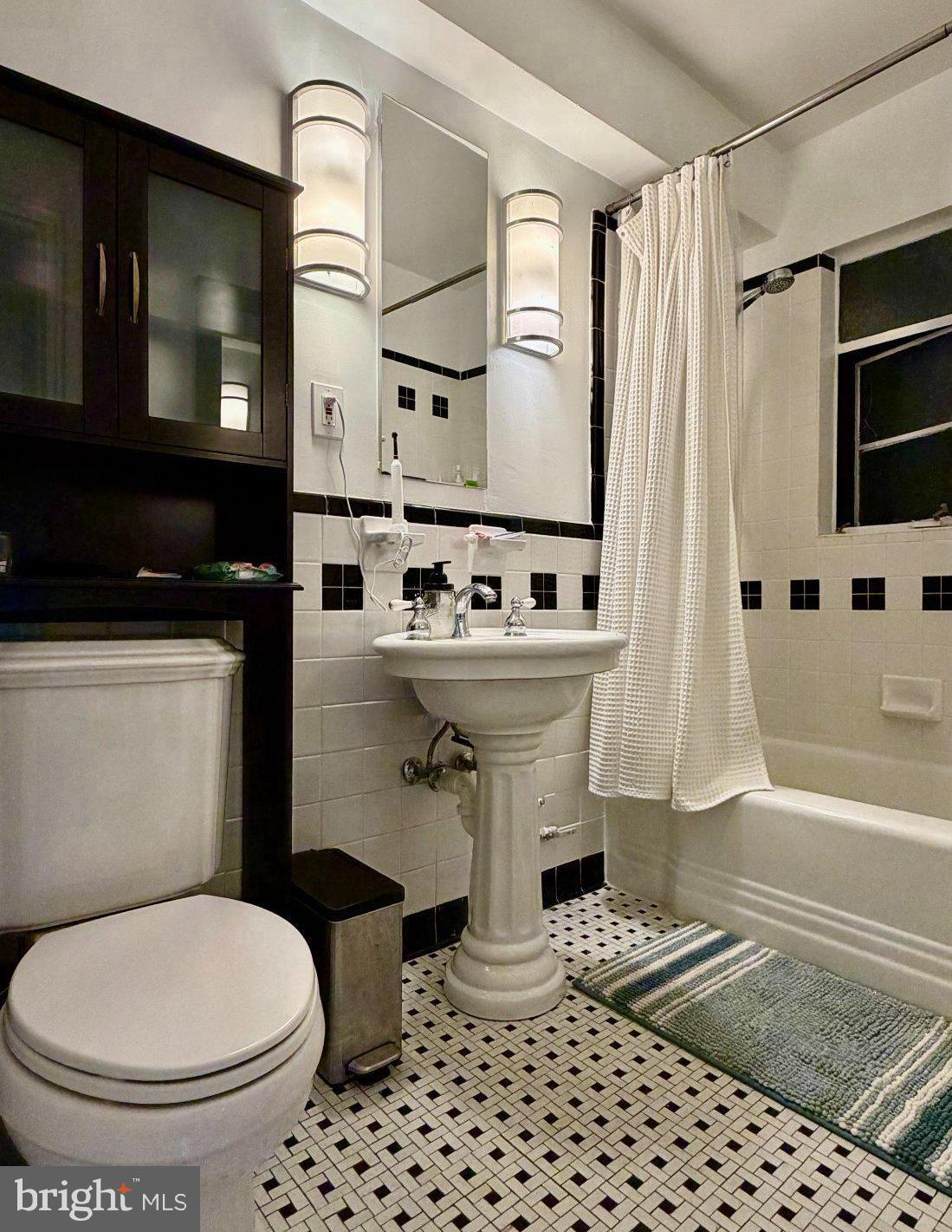 2500 Q Street Northwest, Unit 307 Washington, DC 20007 - Photo 8 of 13 Full bathroom with classic tiles.