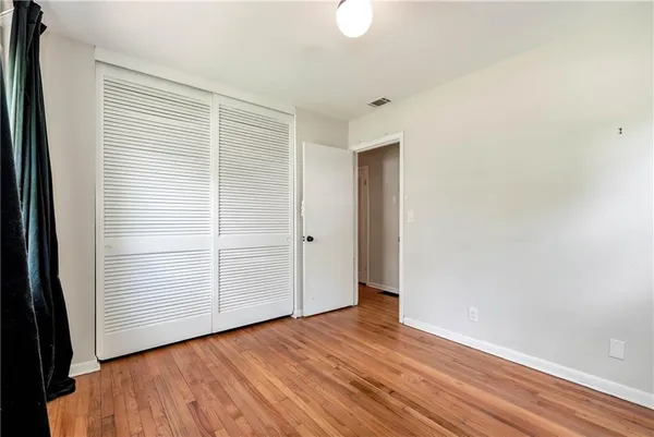 an empty room with closet