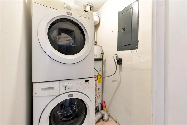 a utility room with dryer and washer