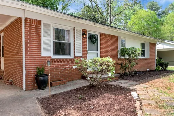 a view of a house with patio
