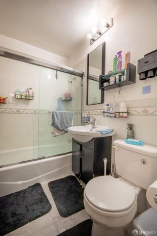 a kitchen with a cabinets and white appliances