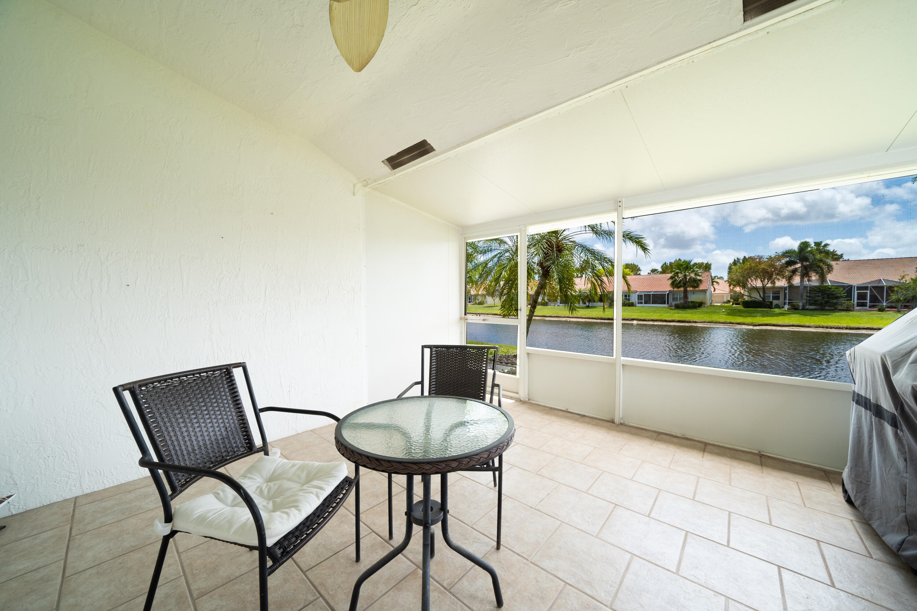 6090 Heliconia Road Delray Beach, FL 33484 - Photo 17 of 20 Back Patio