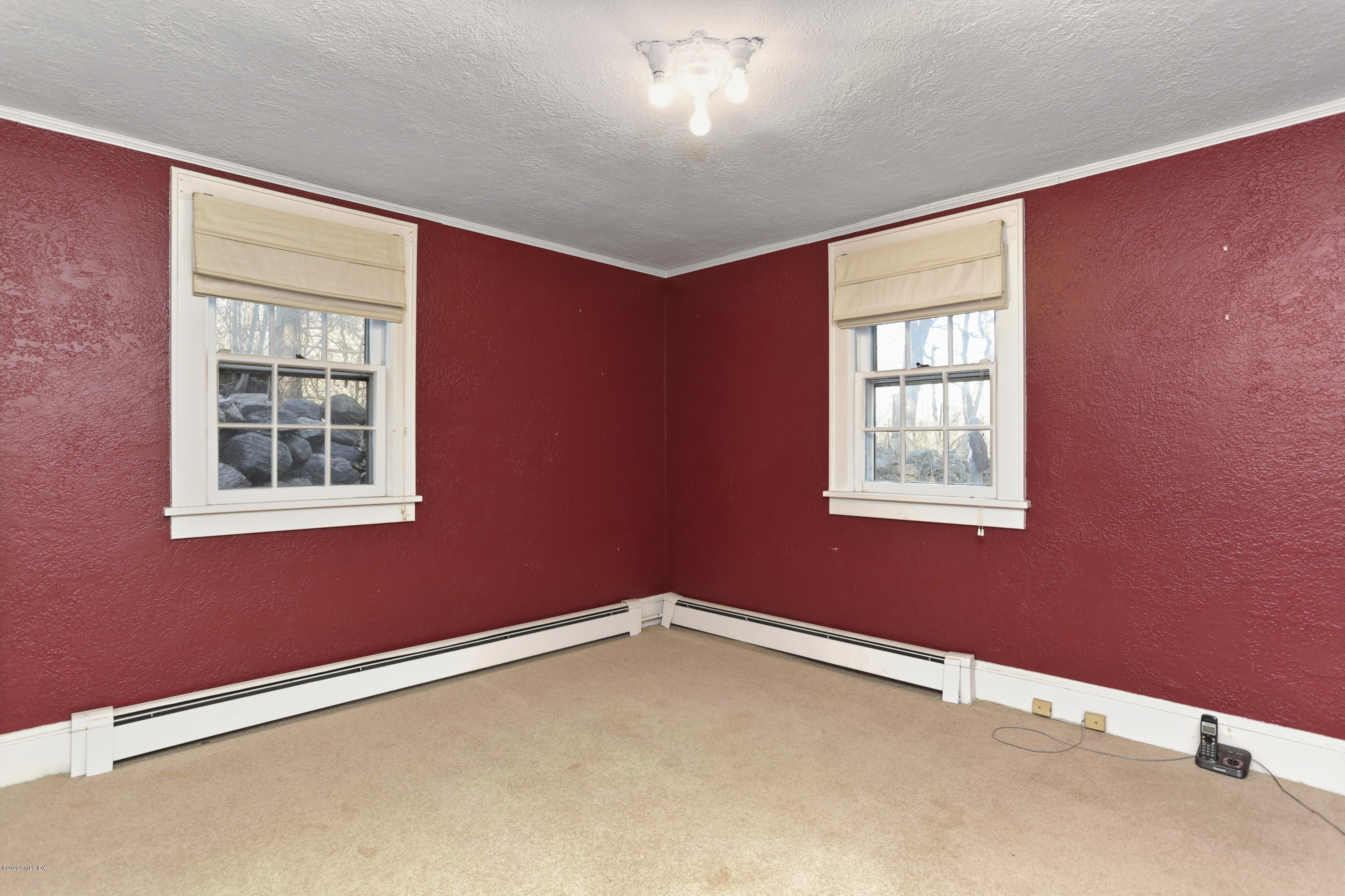 59 Cherry Valley Road Greenwich, CT 06831 - Photo 13 of 19 a view of an empty room with a window