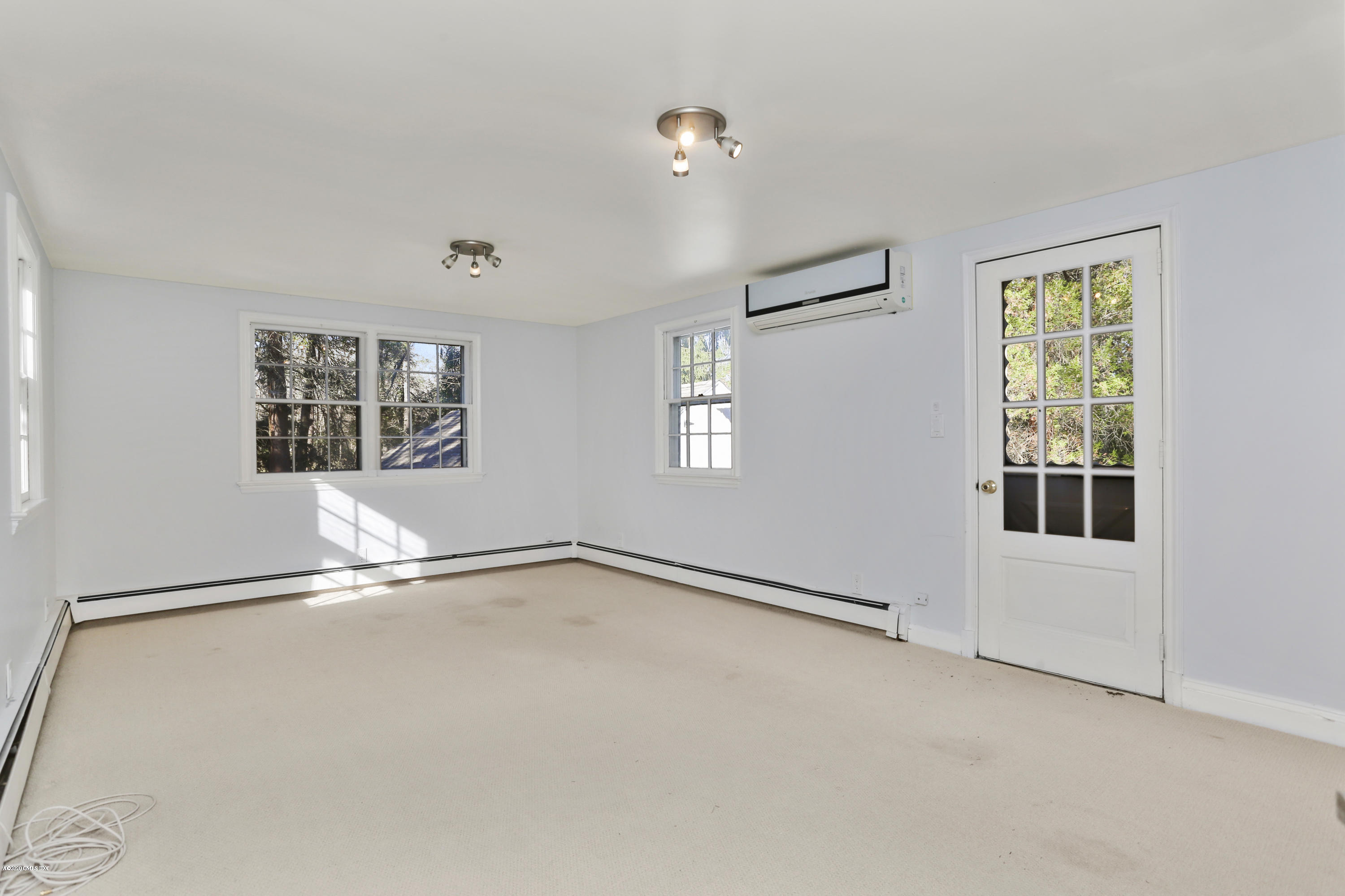 59 Cherry Valley Road Greenwich, CT 06831 - Photo 9 of 19 a view of an empty room with a window