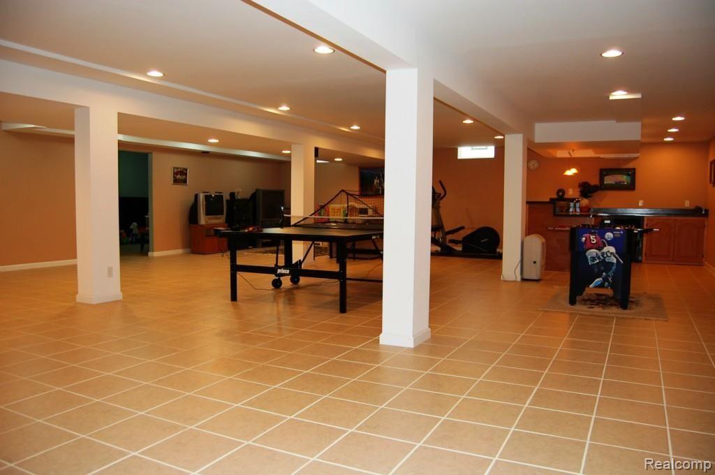 50994 Nesting Ridge Drive Macomb, MI 48044 - Photo 14 of 24 Finished Basement
