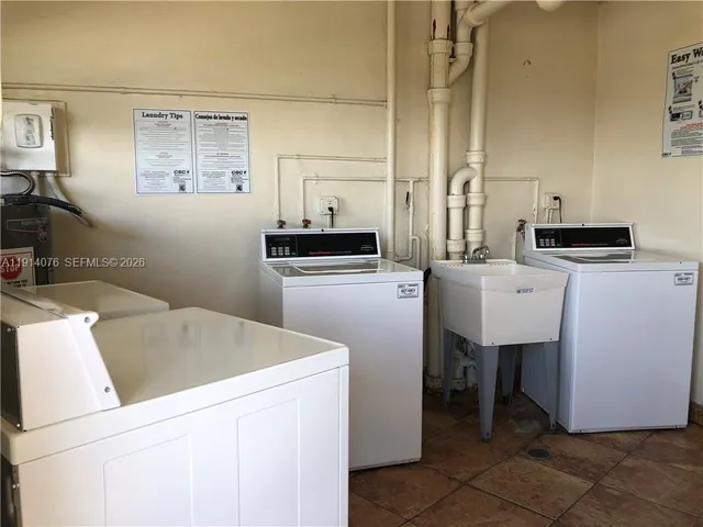 a utility room with washer and dryer