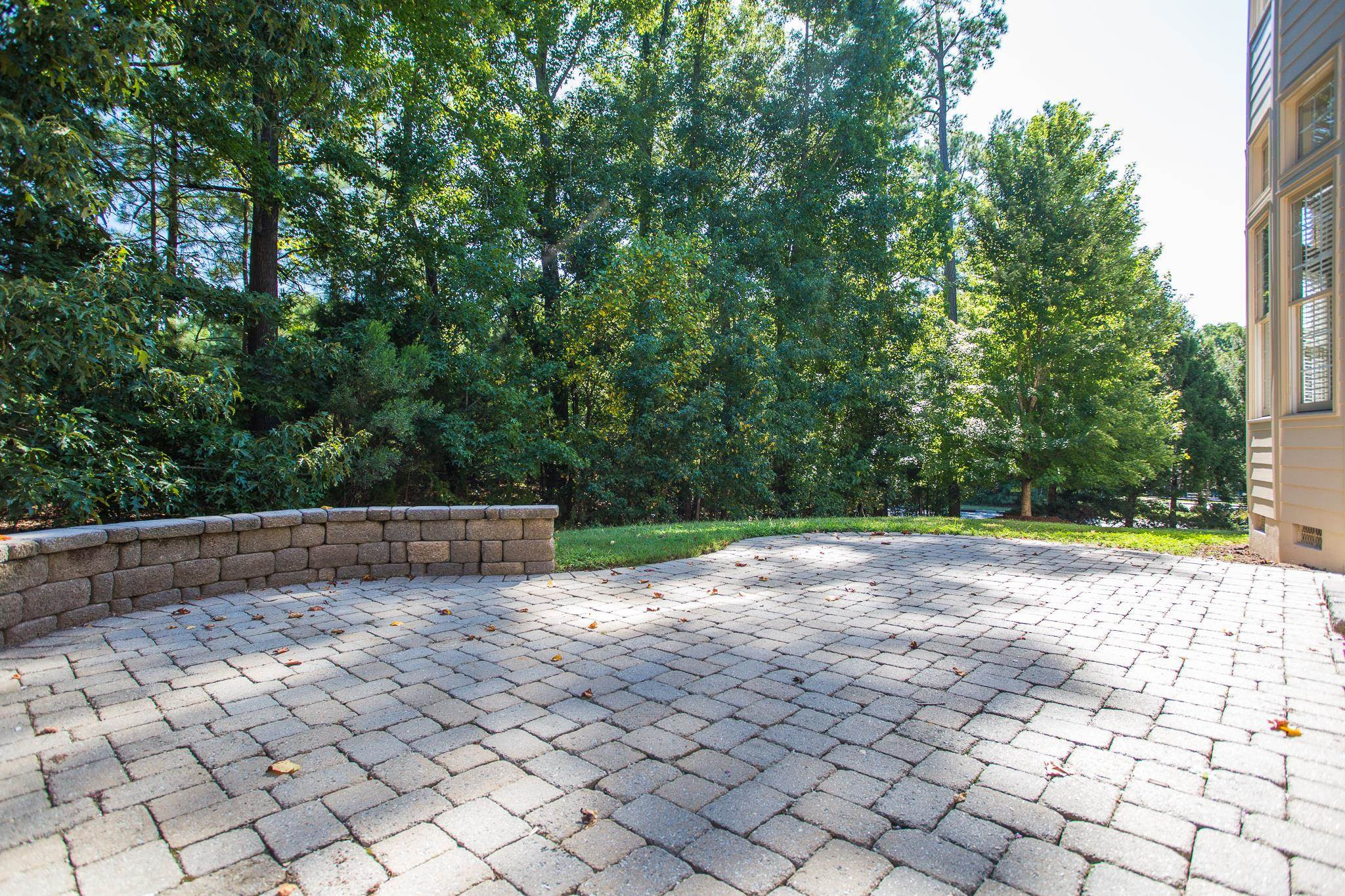 12008 Joseph Drive Raleigh, NC 27614 - Photo 29 of 30 Paver-stone Patio with Firepit