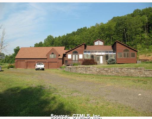 135 Warner Road East Haven, CT 06473 - Photo 1 of 1 a view of a house with a big yard