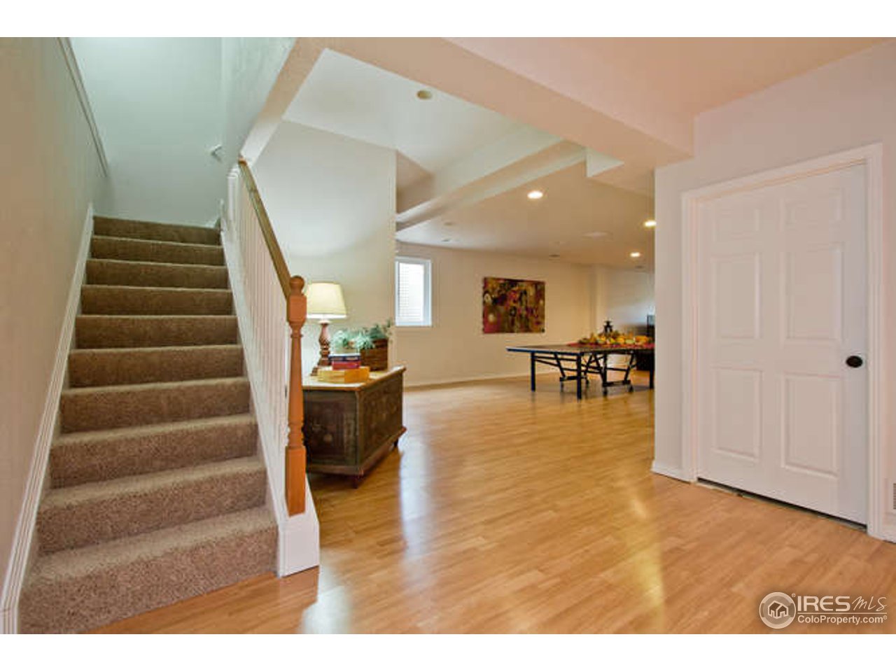 3460 Rookery Road Fort Collins, CO 80528 - Photo 20 of 23 a view of entryway and hall with wooden floor