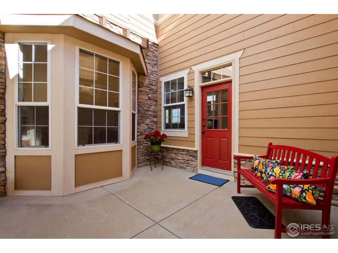 3460 Rookery Road Fort Collins, CO 80528 - Photo 2 of 23 a view of front door with outdoor seating