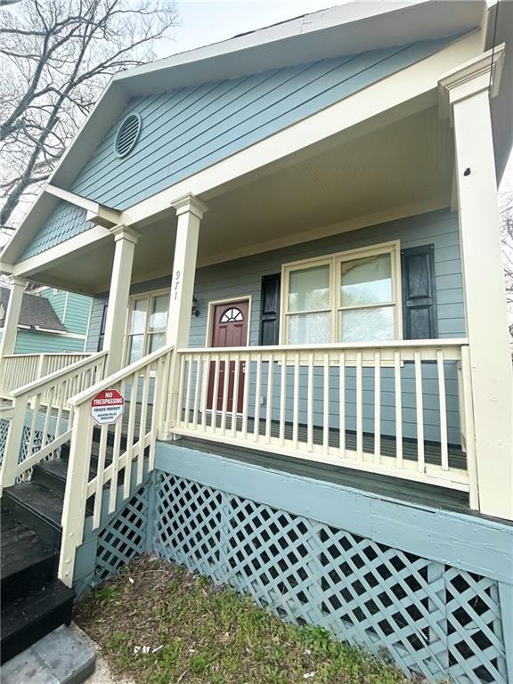 a view of a brick house with large window
