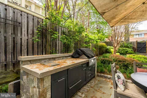 a view of an outdoor space kitchen
