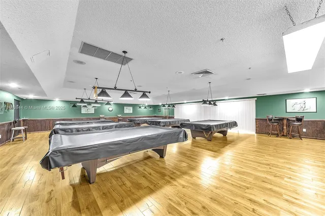 a view of a swimming pool and a chairs