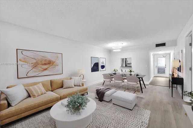 a living room with furniture and a couch