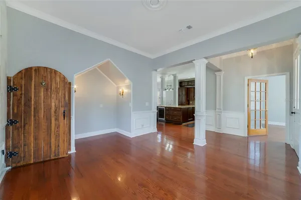 a view of a livingroom with wooden floor