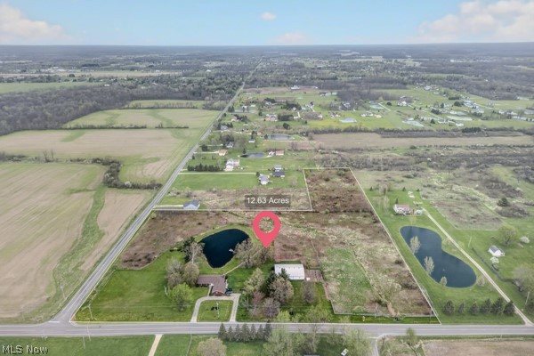 8675 West Smith Road Medina, OH 44256 - Photo 23 of 25 Expansive 12.63-acre parcel featuring two private ponds, established road frontage, and a mix of open land and natural vegetation