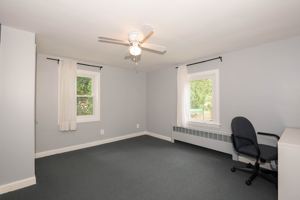 27 Margaret Road Hamilton, MA 01982 - Photo 13 of 30 a view of a workspace with furniture and a window