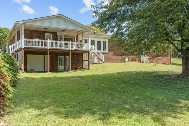 a view of a patio with wooden floor