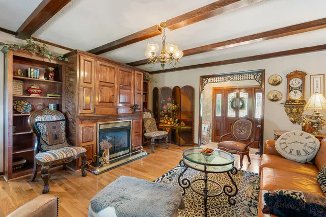 a kitchen with stainless steel appliances granite countertop a refrigerator sink and stove