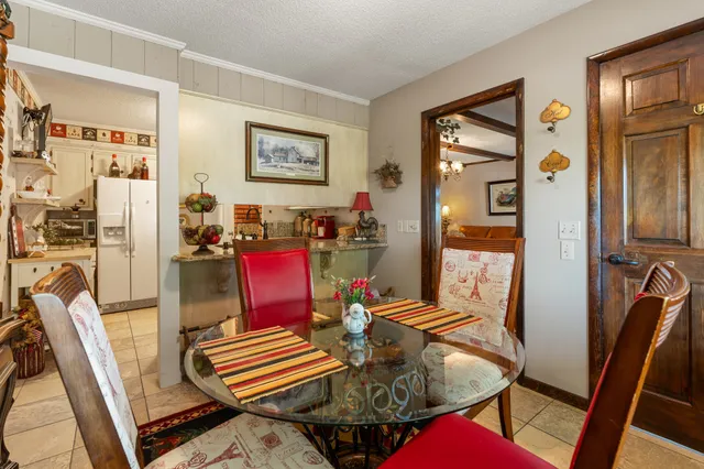a kitchen with cabinets appliances and a counter