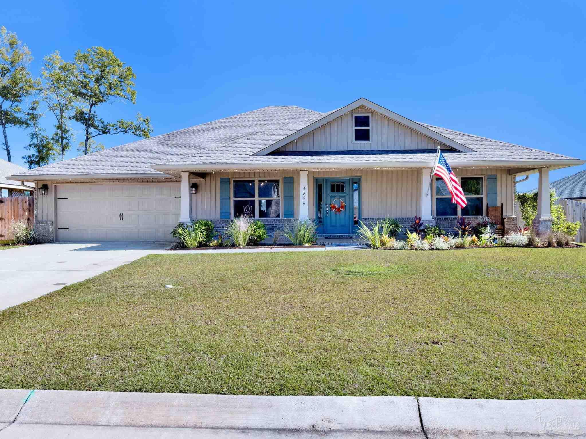 5956 Parsonage Circle Milton, FL 32570 - Photo 58 of 66 a front view of house with yard