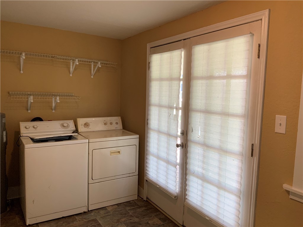 207 North Archer Street Groesbeck, TX 76642 - Photo 14 of 25 a utility room with dryer and washer